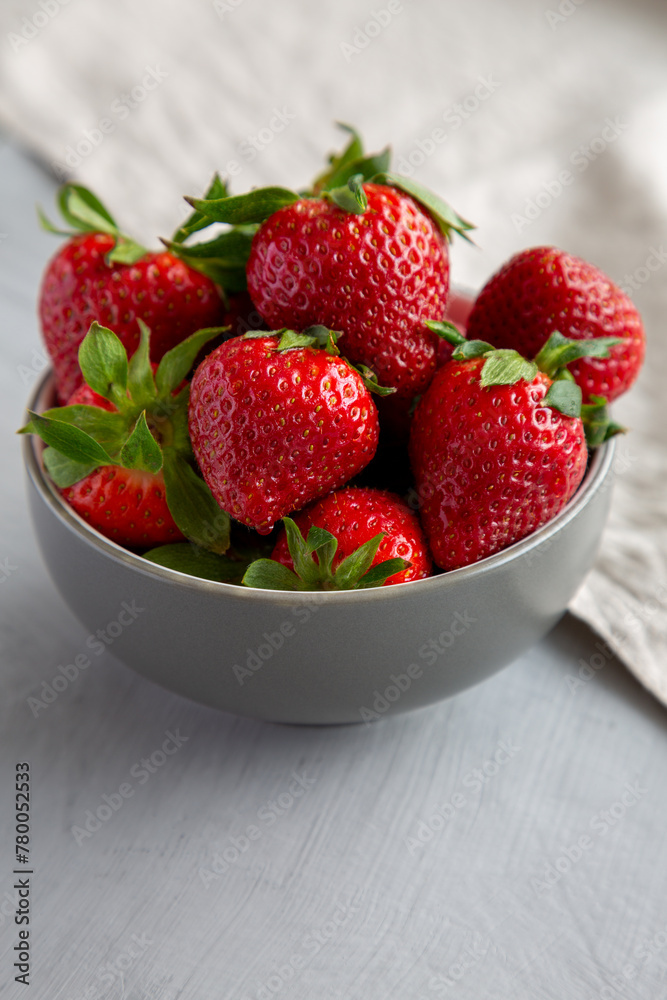 Organic Red Strawberries in a Bowl, side view. Organic Red Strawberries in a Bowl, side view.