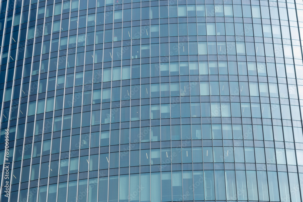 modern office building,modern office building with glass windows, building in the city,blue glass building