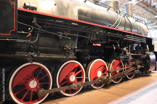 Vintage locomotive retro train. Beautiful locomotive in black and red colors. photo