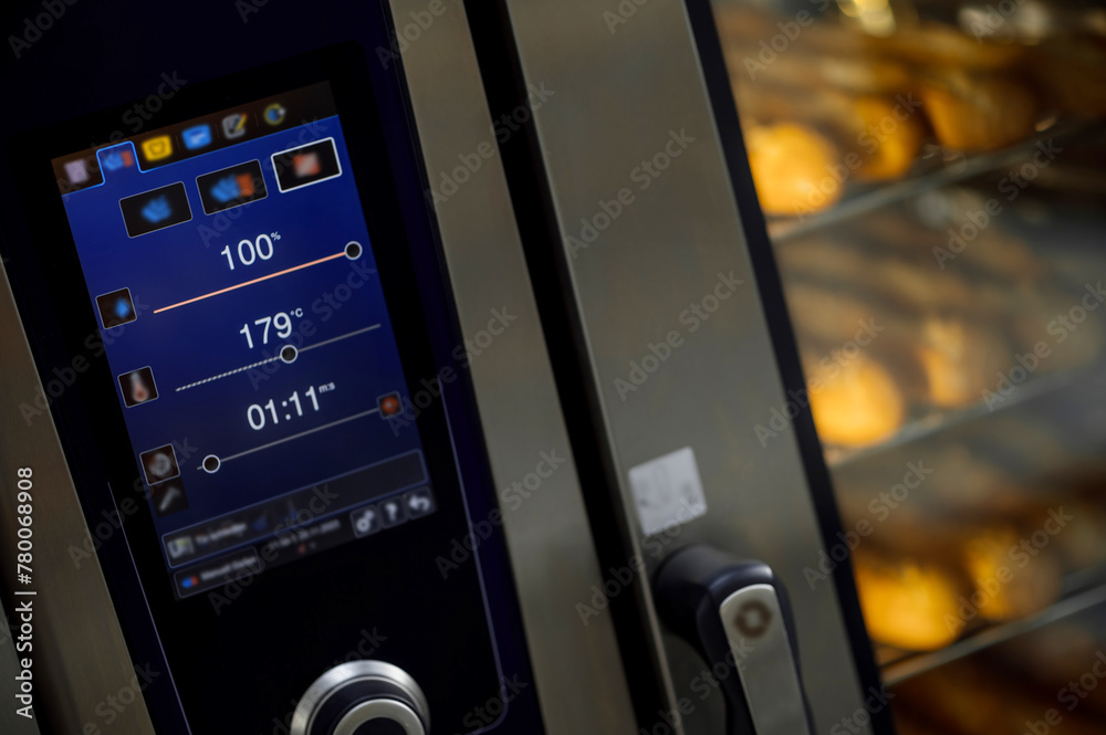 LCD screen of oven with baguette