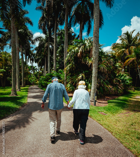 old couple walking in the park love 