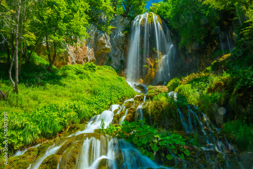 Sopotnica waterfall in Serbia during a summer sunny day photo