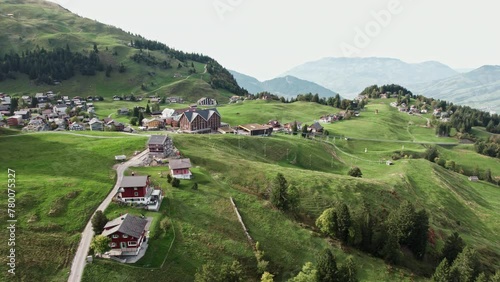 Aerial drone view of Stoos village in Swiss Alps. Mountains of Switzerland. Gentle forward movement