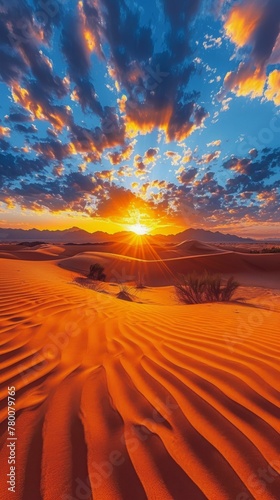Setting Sun Over Sand Dunes