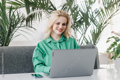 freelancer with notebook in cafe