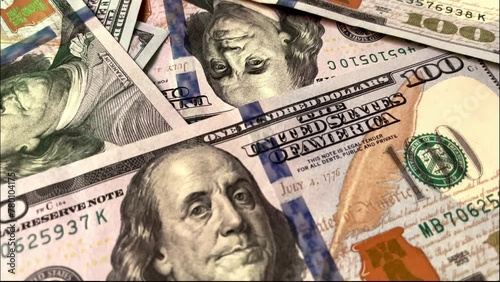 Dynamic closeup of scattered dollar bills in motion capturing wealth and prosperity