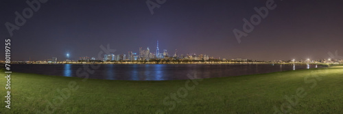 Sunset and Greater City in the background of a beautiful river lake