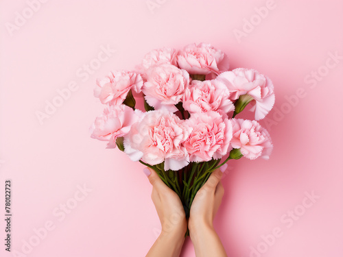 Wallpaper Mural Mother's Day concept woman offers a bunch of elegant pink carnations Torontodigital.ca