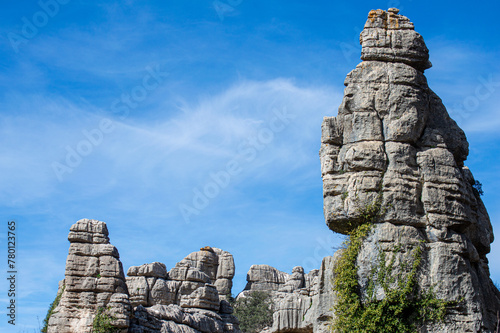 Hiking in the Torcal de Antequerra National Park, limestone rock formations and known for unusual karst landforms in Andalusia, Malaga, Spain.