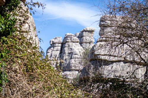Hiking in the Torcal de Antequerra National Park, limestone rock formations and known for unusual karst landforms in Andalusia, Malaga, Spain.