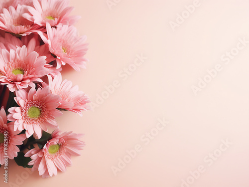 Pink chrysanthemum bouquet against pale pink beige background © Llama-World-studio