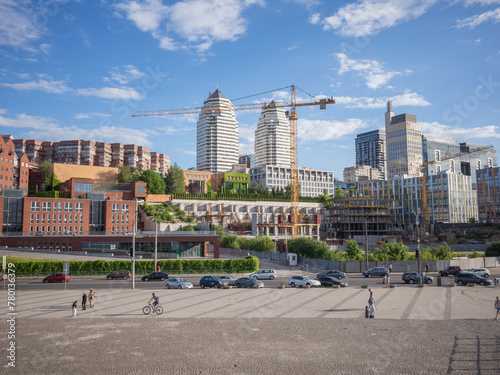 Fotografía people passing in the square and urban cityscape of dnipro city