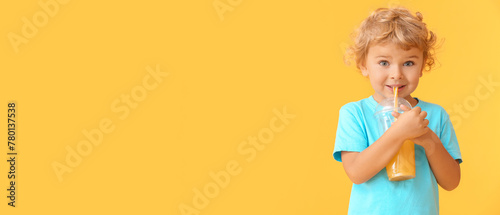 Cute little boy drinking or...