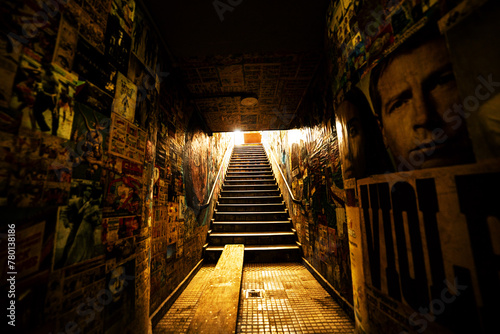 Escadaria de galeria subterrânea com paredes cheia de grafite na cidade  de São Paulo.   photo