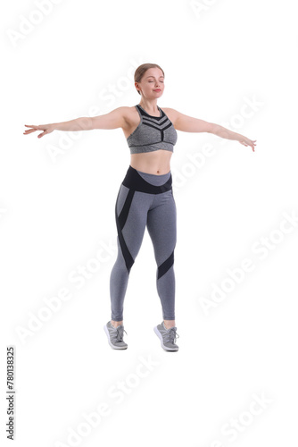 Sporty young woman balancin...