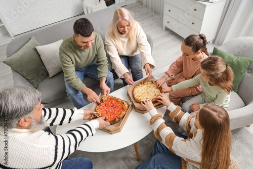 Big family eating pizza at ...