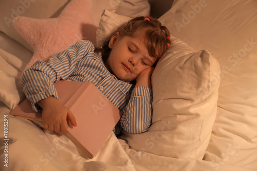 Adorable little girl with b...