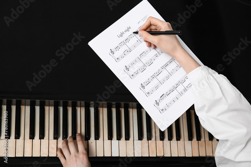 Female hands with pen and m...