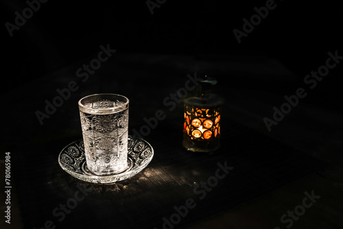 A realistic Arabian interior miniature with window and columns. Meals are served before sunrise called Suhur. Festive greeting card, invitation for Muslim holy month Ramadan Kareem.