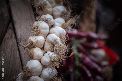 Garlic braids for sell on a Serbian market in Belgrade, Serbia, a country famous for its agriculture and its garlic production. Garlic is also called Allium sativum.