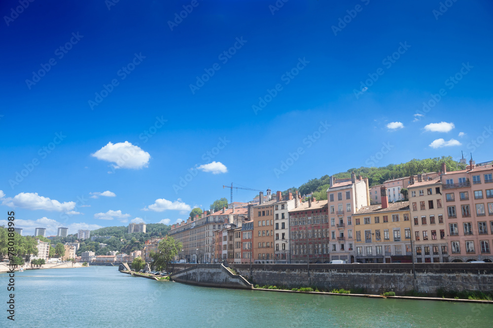 Panorama of Saone river and the Quais de Saone riverbank and riverside in the city center of Lyon, next to the Colline de Fourviere Hill