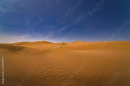 Fototapeta Naklejka Na Ścianę i Meble -  A panoramic sand dune of sahara desert at Mhamid el Ghizlane in Morocco wide shot
