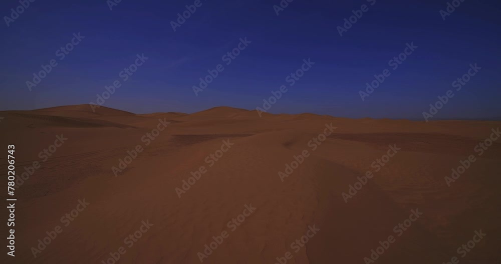 A panoramic sand dune of sahara desert at Mhamid el Ghizlane in Morocco wide shot A panoramic sand dune of sahara desert at Mhamid el Ghizlane in Morocco wide shot