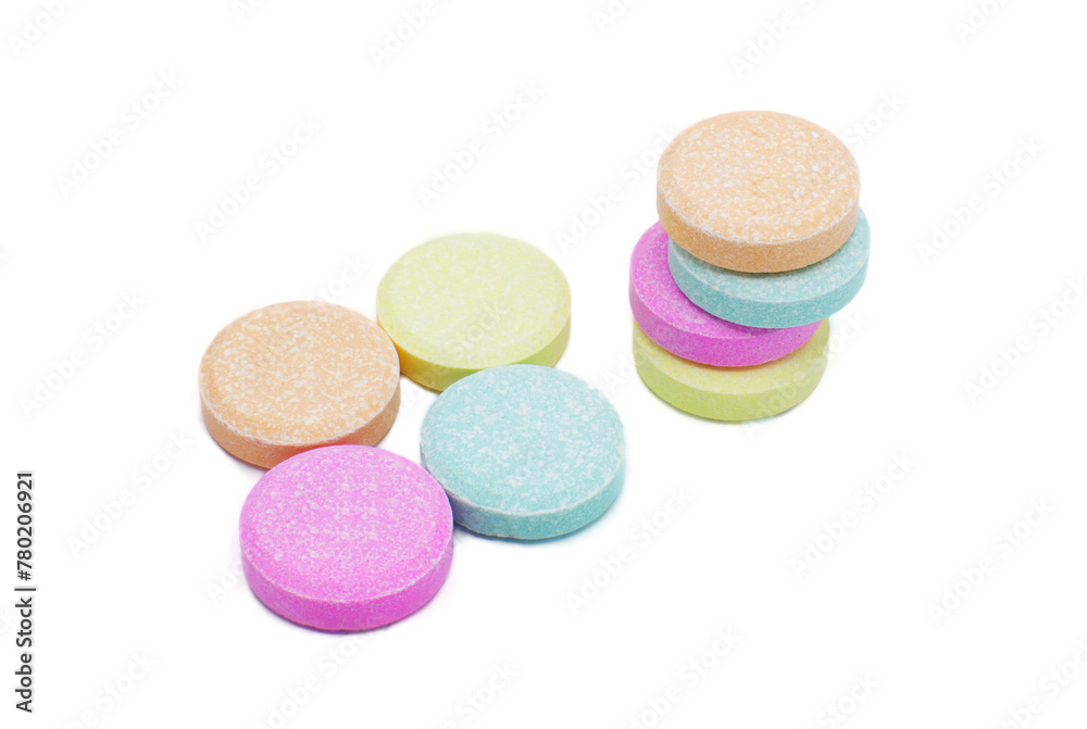 Chewable Antacid tablets for medication, health care concept. Close up of of chewable antacid acid reducer tablets with fruit flavor Isolated on white background Chewable Antacid tablets for medication, health care concept. Close up of of chewable antacid acid reducer tablets with fruit flavor Isolated on white background