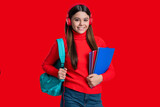 Knowledge day. Concept education. Teen girl student isolated red. September 1. High school education. Knowledge through eLearning. Teen girl hold workbook. Back to school. Electronic study materials