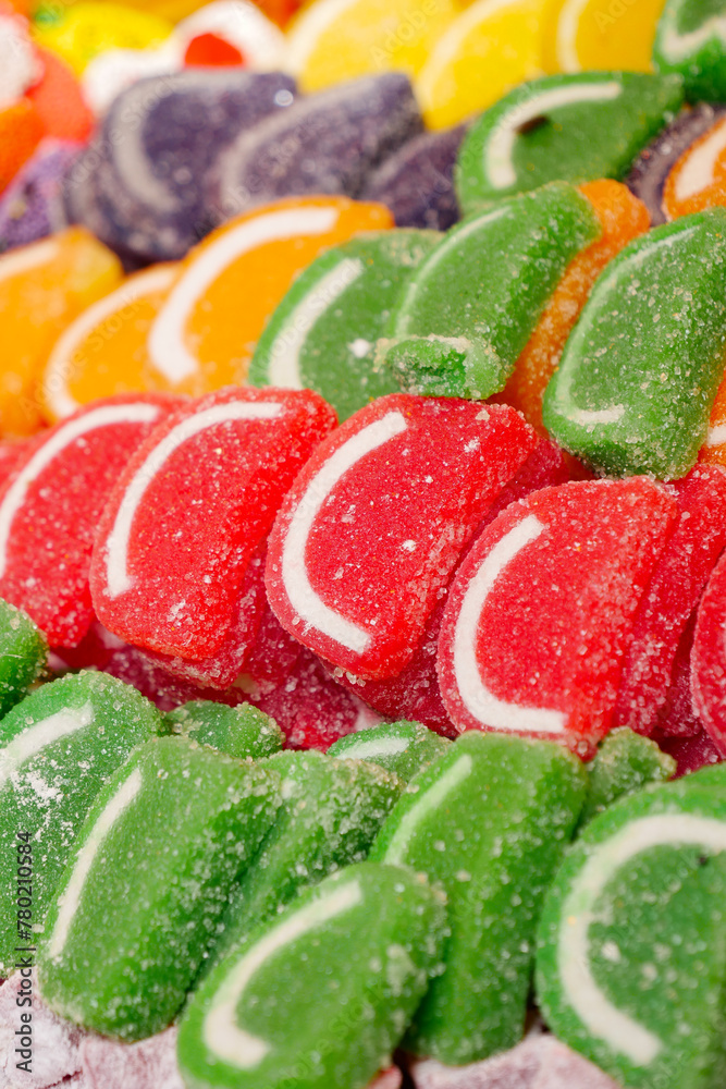 sugar coated jelly beans in the form of colored sliced fruit sugar coated jelly beans in the form of colored sliced fruit