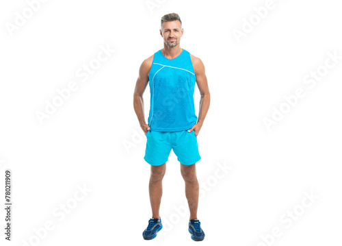 glad athlete wearing sport wear standing alone. The male sport athlete posing on studio. sport athlete with fit body isolated against white. Sport and healthy lifestyle. full length of athlete
