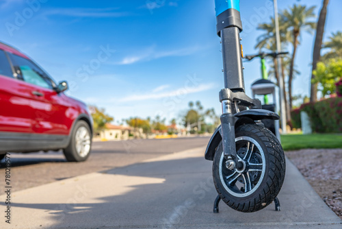 Selective focus on front wheel of a rental electric scooter in Phoenix  Arizona 