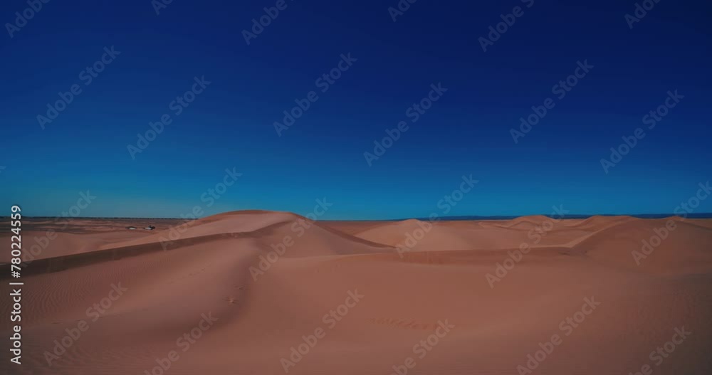 A panoramic sand dune of sahara desert at Mhamid el Ghizlane in Morocco tilt down A panoramic sand dune of sahara desert at Mhamid el Ghizlane in Morocco tilt down