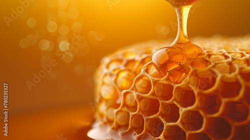A honeycomb with honey dripping
