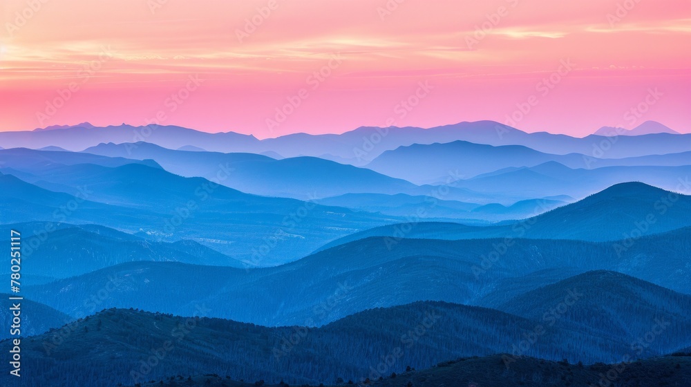 Fototapeta premium As the sun dips below the horizon, its fading light illuminates the mountain range in a spectacular display of colors. The peaceful transition from day to night over the mountain, AI Generative
