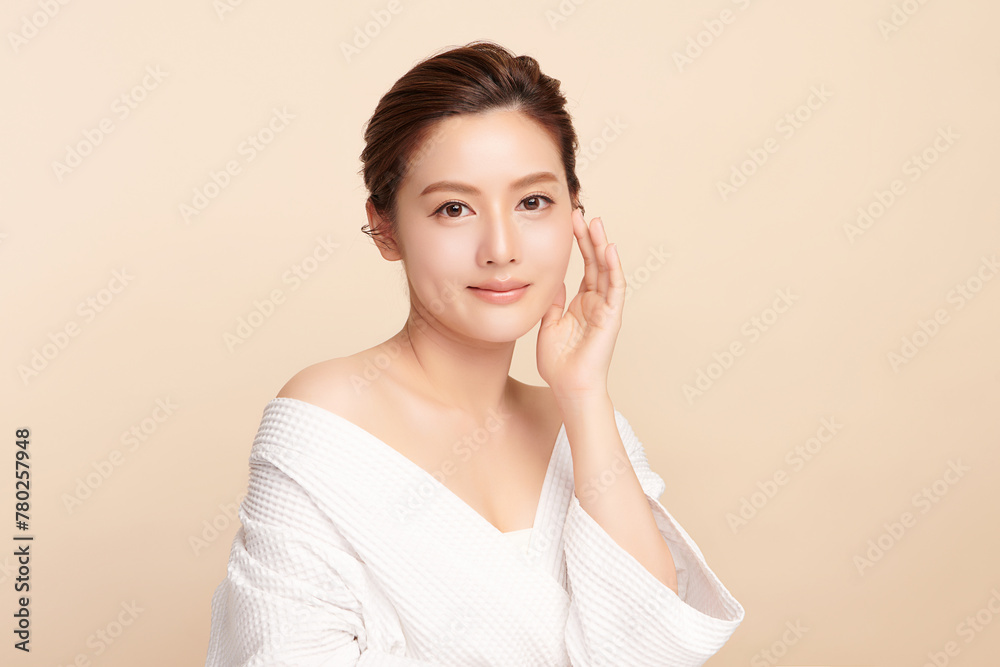 Beautiful young asian woman with clean fresh skin on beige background, Face care, Facial treatment, Cosmetology, beauty and spa, Asian women portrait. Beautiful young asian woman with clean fresh skin on beige background, Face care, Facial treatment, Cosmetology, beauty and spa, Asian women portrait.