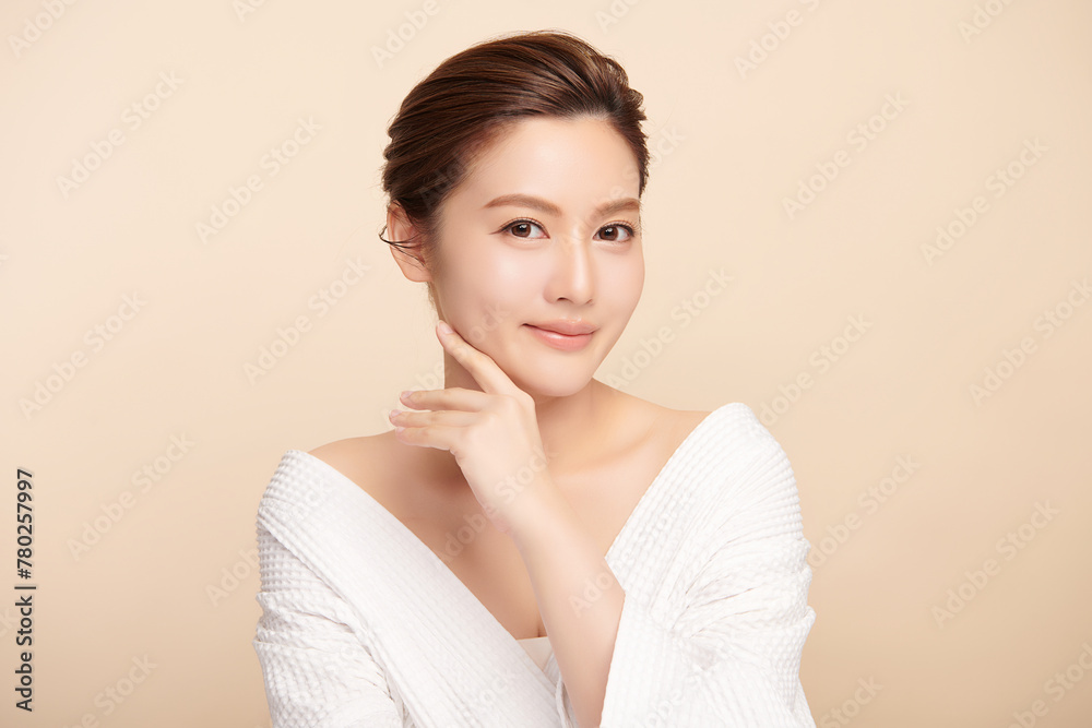 Beautiful young asian woman with clean fresh skin on beige background, Face care, Facial treatment, Cosmetology, beauty and spa, Asian women portrait. Beautiful young asian woman with clean fresh skin on beige background, Face care, Facial treatment, Cosmetology, beauty and spa, Asian women portrait.
