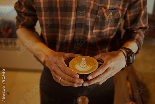 Person Holding Cup of Coffee, Close-Up Shot With Hands Gripping Warm Beverage
