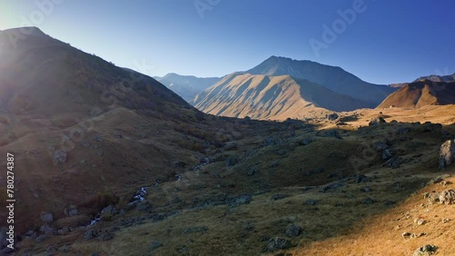 Scenic view of hills and slopes of Caucasus mountains in sunshine, Tusheti region, Georgia photo