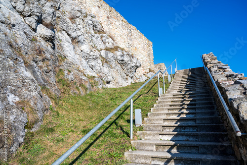 Photography Stairs under the historic stone walls of Devín Castle on a rocky cliff