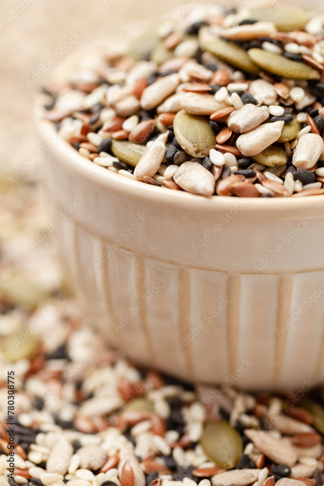 Seeds mix in bowl. Sunflower, black and white sesame, flax and pumpkin seeds Seeds mix in bowl. Sunflower, black and white sesame, flax and pumpkin seeds