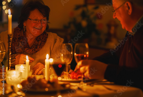 Old smiling couple in romantic evening atmosphere