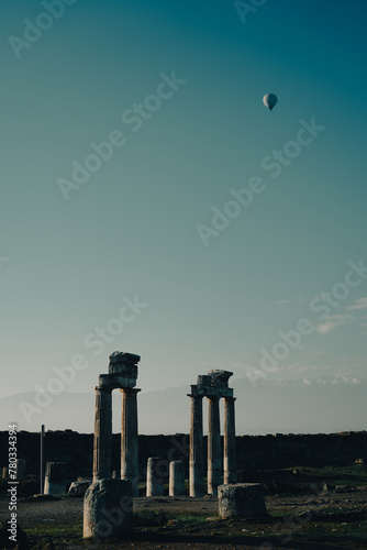 Hot air ballon over ancient arches photo