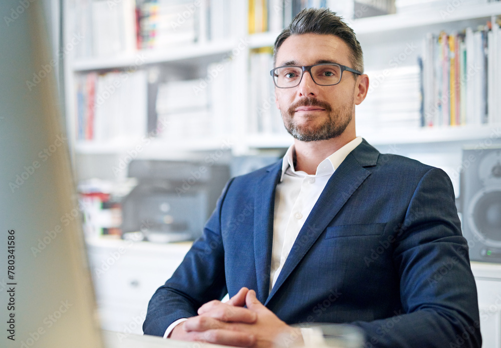 Portrait, business and management with mature man at desk in office for corporate or professional career. Glasses, serious and suit with confident boss, CEO or manager sitting in company workplace Portrait, business and management with mature man at desk in office for corporate or professional career. Glasses, serious and suit with confident boss, CEO or manager sitting in company workplace