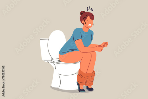 Woman poops sitting on toilet and suffers from constipation caused by indigestion or stomach problems. Girl pushing on toilet in WC, needing medicinal laxatives to normalize health