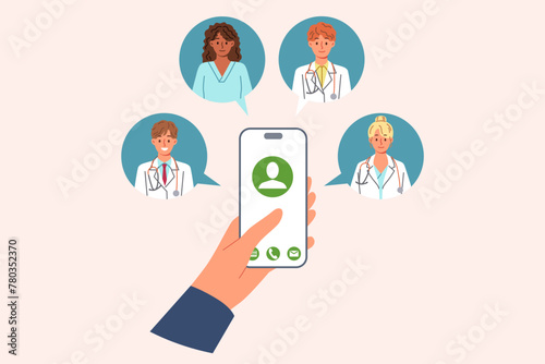 Doctors around mobile phone in patient hand, for concept calling medical personnel at home, for first aid. Person calls doctors for advice when symptoms of illness or deterioration in health appear