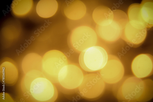 Yellow Bokeh light on out focus abstract Background.