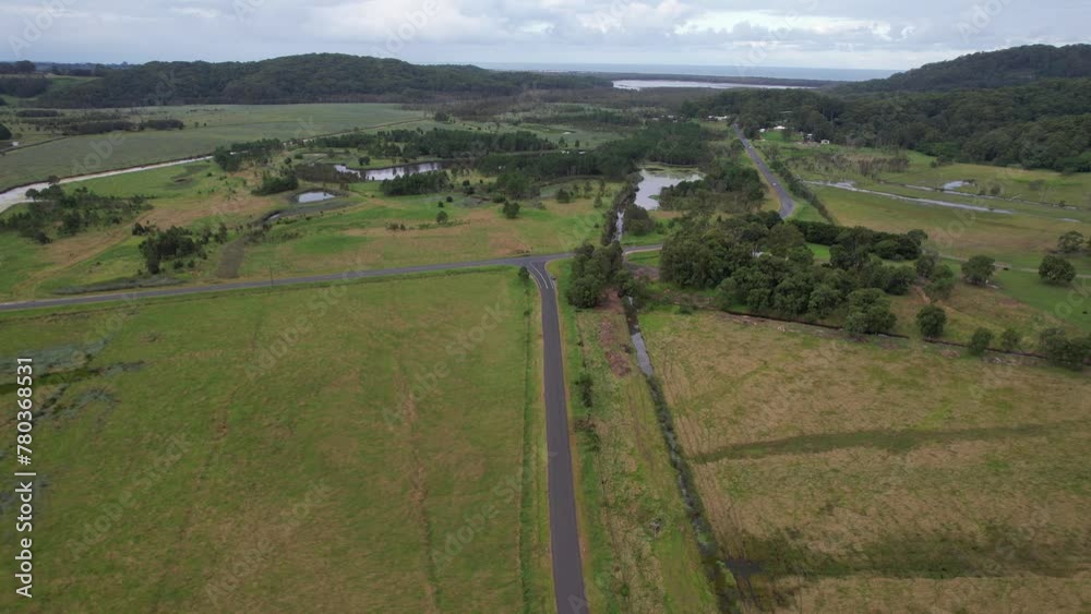 Lush Fields Along Clothiers Creek Road In Tanglewood, NSW, Australia. aerial shot