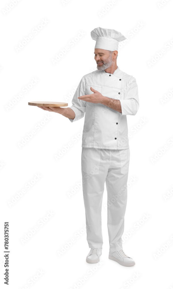 Happy chef in uniform pointing at wooden board on white background Happy chef in uniform pointing at wooden board on white background