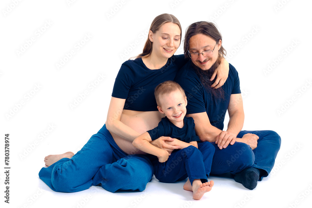 beautiful european happy family with a pregnant mother, the father and a son together. High quality photo